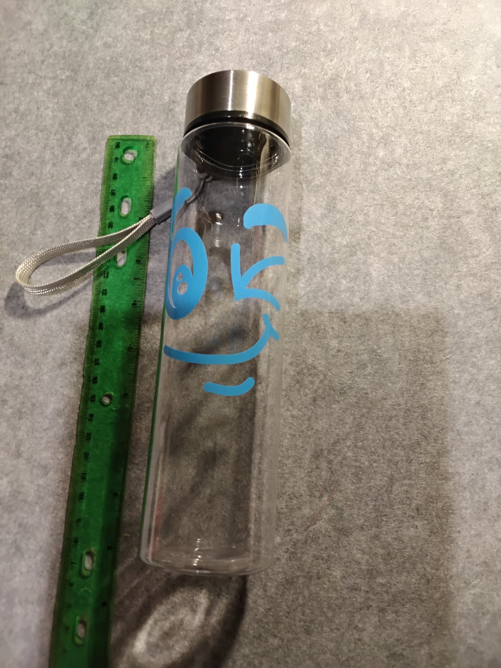 9" Acrylic Water Bottle with customizable design -winking smile